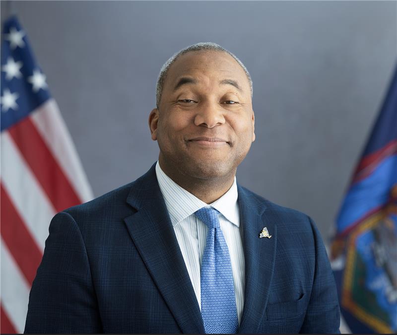 Headshot of Commissioner Hogues